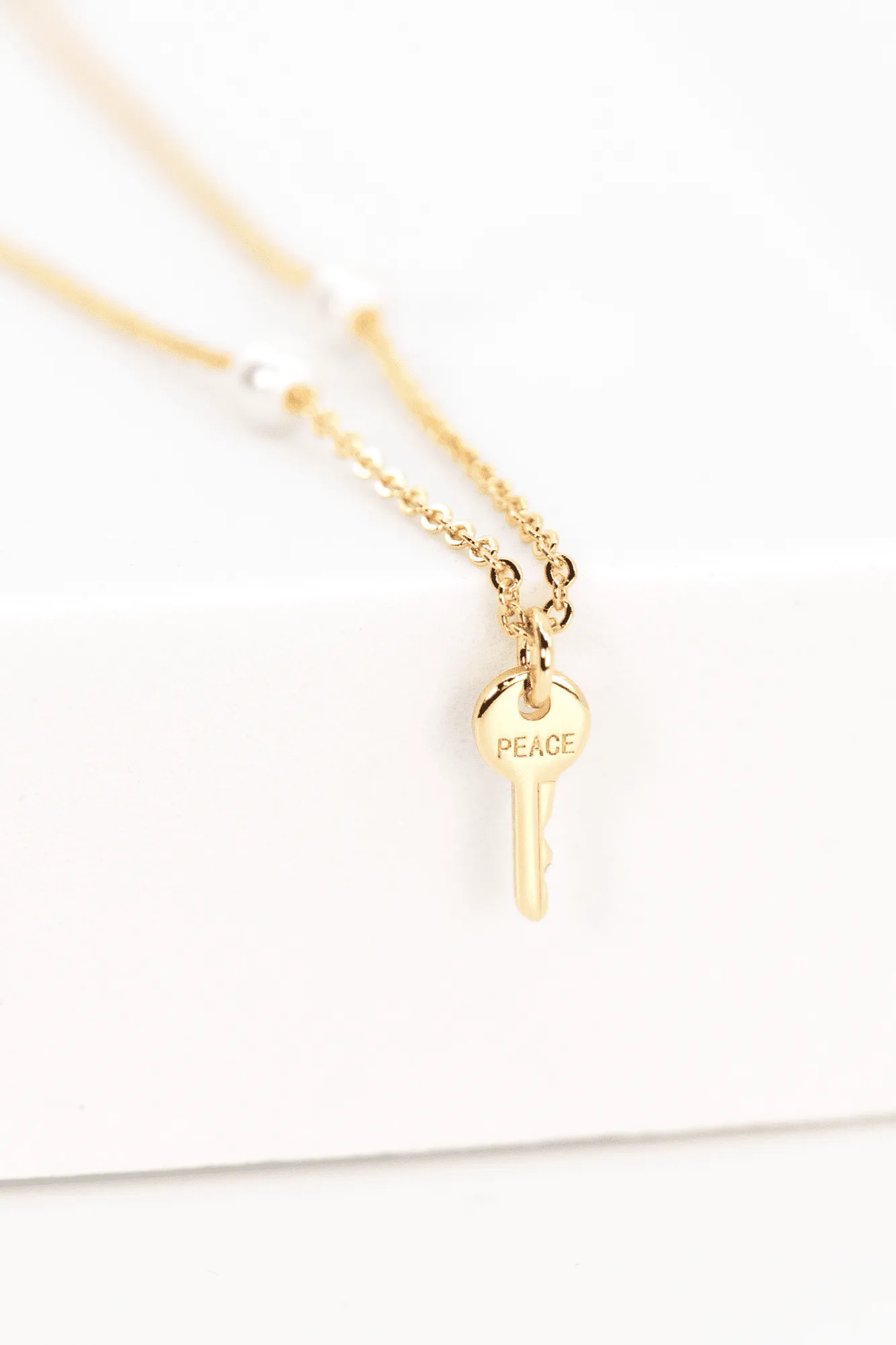 Peaceful Pearl Mini Key Necklace
